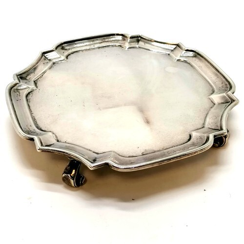 Antique silver salver on 4 scroll feet by Goldsmiths and Sil...