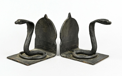 Bookends, decorated with cobra figu