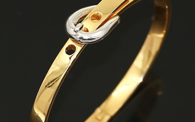 Bracelet jonc en or jaune et or gris 750 millièmes simulant une ceinture. 6X4.8 cm...