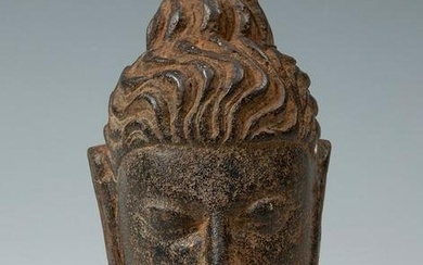 Buddha head. India, 19th century. Carved stone.