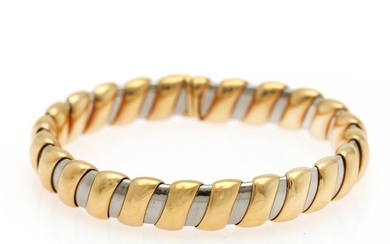 Bulgari: A flexible bangle of 18k gold and white gold. Diam. app. 16 cm.