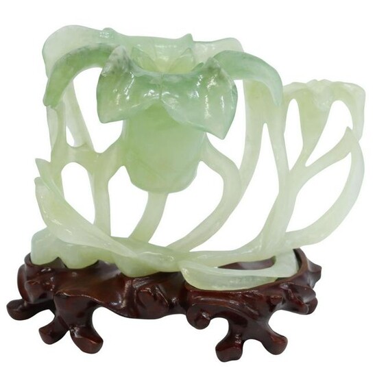 CHINESE CARVED GREEN HARDSTONE FLOWER ON STAND