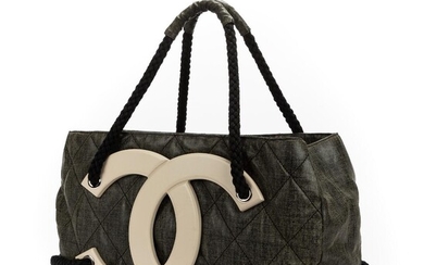 Chanel: A bag made of dark grey quilted leather with beige CC logo on the front, two handles and silver tone hardware. – Bruun Rasmussen Auctioneers of Fine Art