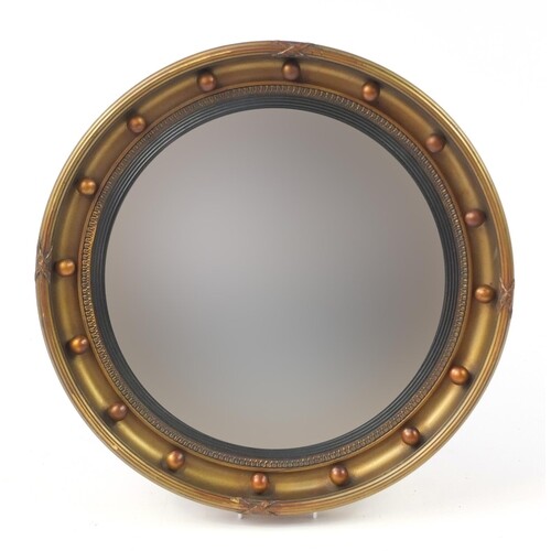Circular gilt framed convex mirror, 47cm in diameter