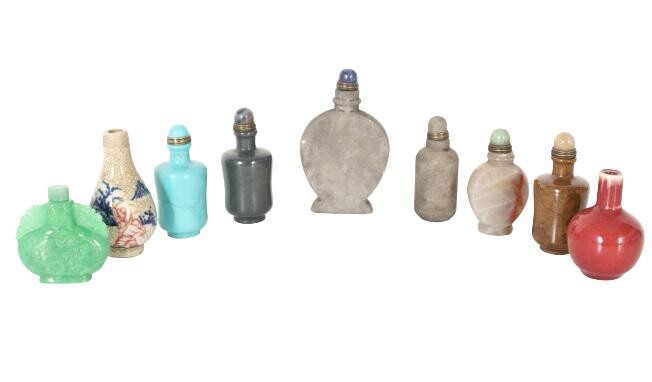Collection of (9) Stone & Porcelain Snuff Bottles