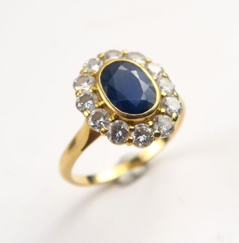Daisy ring, sapphire set in a diamond setting.