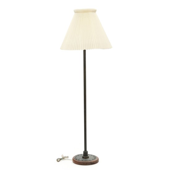 Danish design: Floor lamp of patinated browned brass. Le Klint shade of pleated white acrylic.