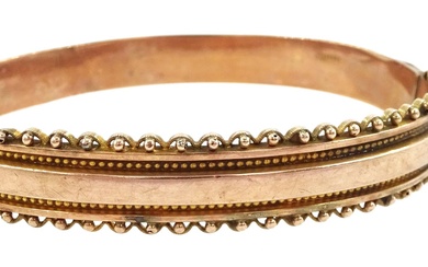 Early 20th century 9ct rose gold hinged bangle