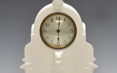 Earthenware savings clock, white matt-glaze, decorated with two deers and...