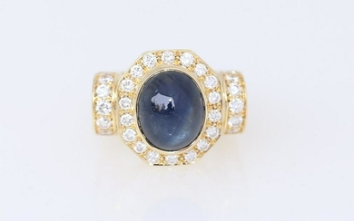 Fine Yellow gold Sapphire & Diamonds ring.