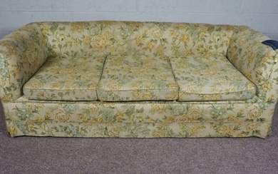 Floral 3 seater Chesterfield sofa with denim patchwork to the right arm.
