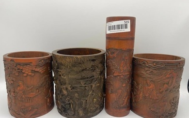Group of 4 carved bamboo brush pots