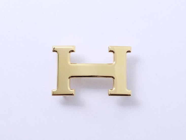 HERMES ''H''. Gold-plated metal belt buckle, H-shaped. Signed,...