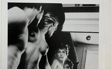 Helmut Newton, "Couple reflected in mirror"