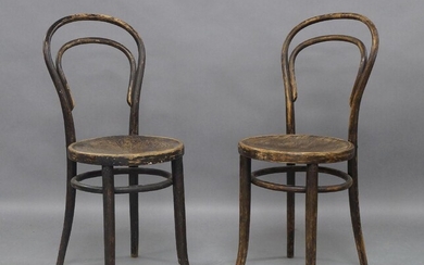 Jacob & Josef Kohn, a pair of stained beech and bentwood chairs, early 20th century, with hooped backrests, the circular seats impressed with shell motifs, on tapered supports, underside of seats each stamped manufacturer's marks (2)