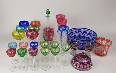 LOT of cut and tinted crystal: wine glasses, alcohol glasses,...