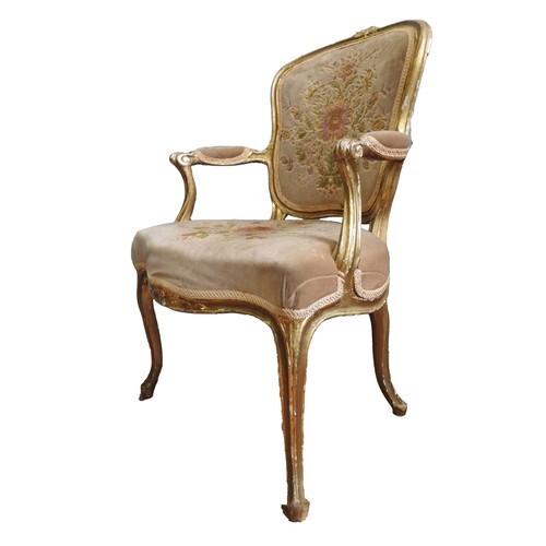 LOUIS XV GILTWOOD FAUTEUIL 18TH CENTURY the shaped back, pad...
