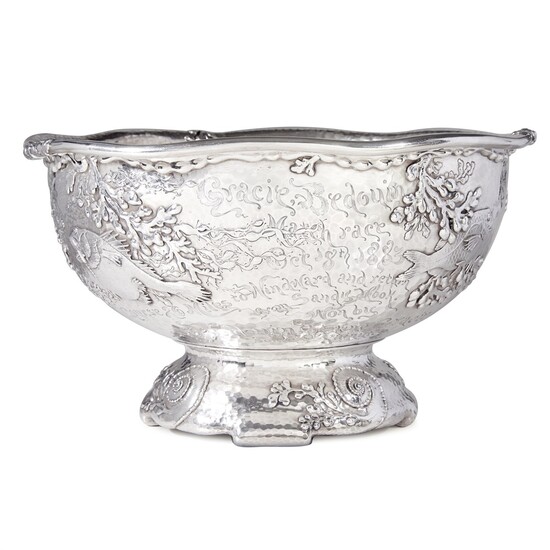 Large hammered sterling silver and parcel-gilt presentation punch bowl Tiffany & Co., New York, NY, dated "1883"