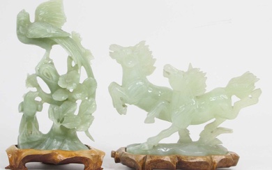 Lot details Two Chinese green carved polished hardstone animal figures,...
