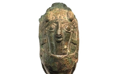Luristan Bronze bracelet decorated with faces, 9 cm diam. Exhibited at Ifergan Museum