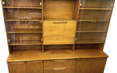 MEREDEW; a mid century teak wall unit, the pair of...