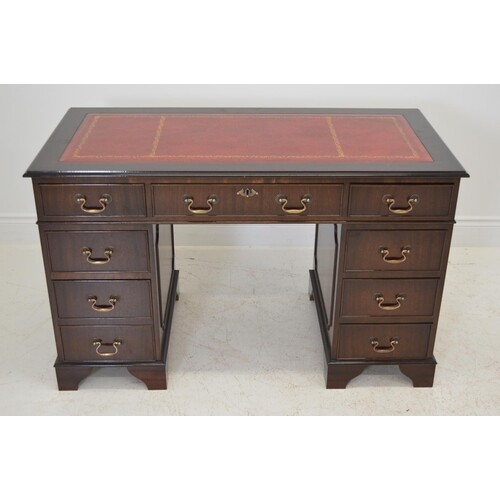 Mahogany pedestal desk with inset leather top in the Georgi...