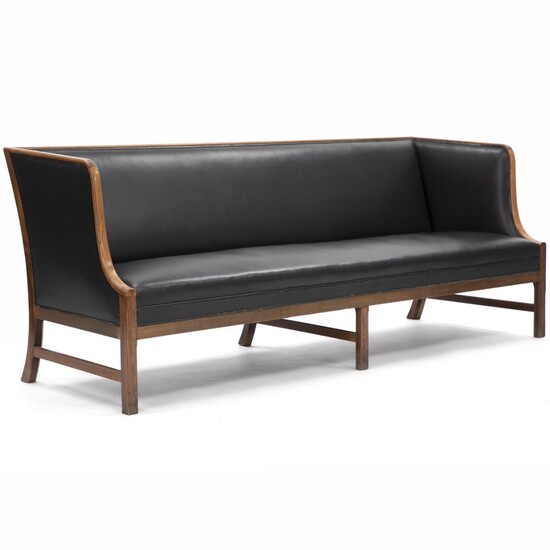 SOLD. Ole Wanscher: Three seater sofa with Brazilian rosewood frame. Upholstered with black leather. Made by A.J. Iversen. H. 82 cm. L. 210 cm. D. 74 cm. – Bruun Rasmussen Auctioneers of Fine Art