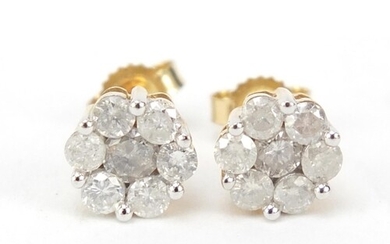 Pair of 9ct gold diamond flower head earrings, approximately...