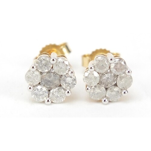 Pair of 9ct gold diamond flower head earrings, approximately...