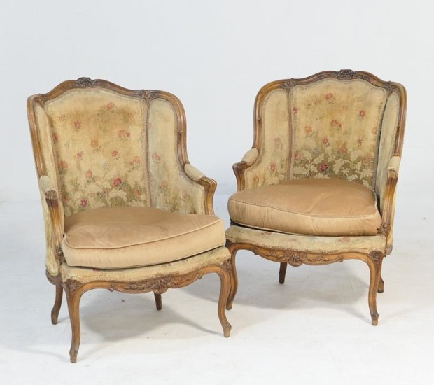 Pair of French walnut and upholstered tub chairs, circa...