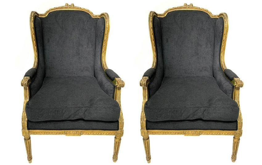 Pair of bergère armchairs in gilted wood, XX century.