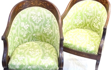 Paire de fauteuils gondole Charles X marquetés de filets floraux en citronier sur placage d'acajou....