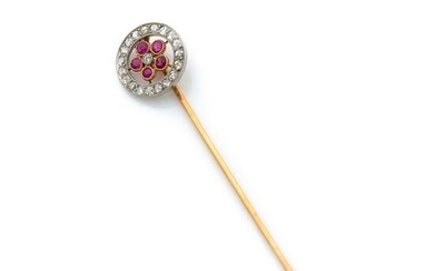 Pin in 18K openwork two-tone gold Epingle en or 18k (750‰) adorned with a flower set with