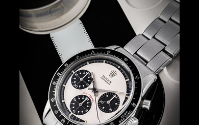 ROLEX. A VERY RARE AND WELL PRESERVED STAINLESS STEEL CHRONOGRAPH WRISTWATCH WITH BRACELET AND “PAUL NEWMAN” DIAL DAYTONA MODEL, REF. 6264