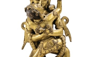 STATUETTE DE CHAKRASAMVARA EN ALLIAGE DE CUIVRE DORÉ TIBET, XIVE-XVE SIÈCLE | 西藏 十四至十五世紀 鎏金銅合金勝樂金剛立像 | A gilt-copper alloy figure of Chakrasamvara, Tibet, 14th/15th century