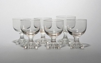 Six glass rummers 19th century, with generous rounded bowls raised...