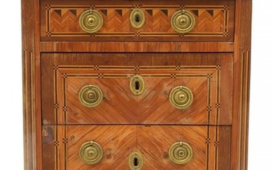 Small Transition style chest of drawers in veneer, geometrical marquetry and in curl opening by three drawers. Gilded bronze ornamentation. Topped by a grey veined white marble shelf. Stamped S. Life for Sébastien Vié (Master on October 5, 1767) as...