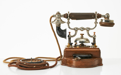 TABLE TELEPHONE, L.M. Ericsson & Co. Stockholm, first year of the 20th century (Seen in the 1901 catalogue), model no. 765, with handheld microphone No. 525, self-selector for 10 telephone lines, walnut case, pre-brass and nickel-plated details.
