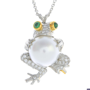 TIFFANY & CO. - a cultured pearl, diamond and emerald frog pendant.