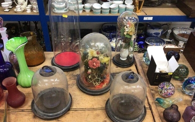 Three antique glass domes (two with artificial flowers) together with two glass-domed lanterns with blue glass shell-form tops (5)