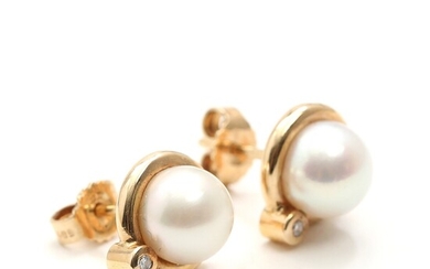 SOLD. Toftegaard: A pair of pearl and diamond earrings, set with cultured pearls and brilliant-cut...