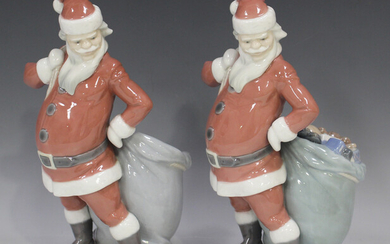 Two Lladro figures, comprising Santa Claus, No. 4904, and Santa Claus with Toys, No. 4905, height 21