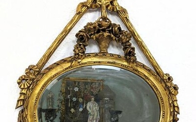 Vintage Gilt Carved Wood Mirror. Ribbon draped design w