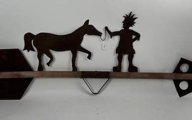 WOOD AND TIN NATIVE AMERICAN WEATHER VANE 20th Century Height 28". Length 87".