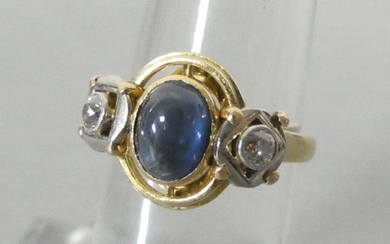 Yellow and white gold ring centered on a...
