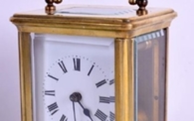 A LEATHER CASED FRENCH BRASS CARRIAGE CLOCK. 17 cm high