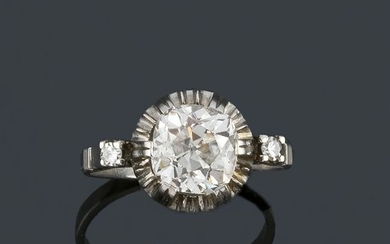 Solitaire ring with cushion cut diamond