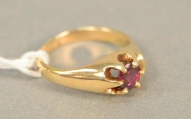 14K gold ring set with ruby. approximately .50 carats.