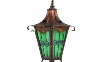 AN ARTS AND CRAFTS COPPER HANGING LANTERN, of...