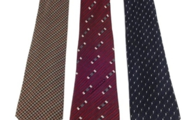 BALENCIAGA - three ties. To include a dark blue tie